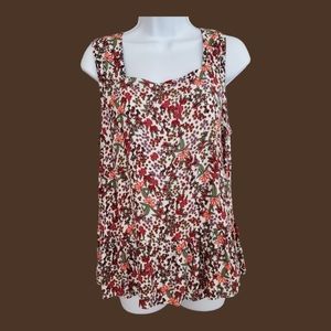 Ann Taylor Loft sleeveless peplum blouse, size medium, white with floral pattern